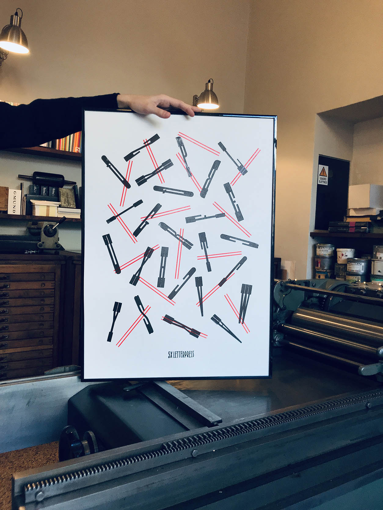 frame with a letterpress poster in a printing workshop