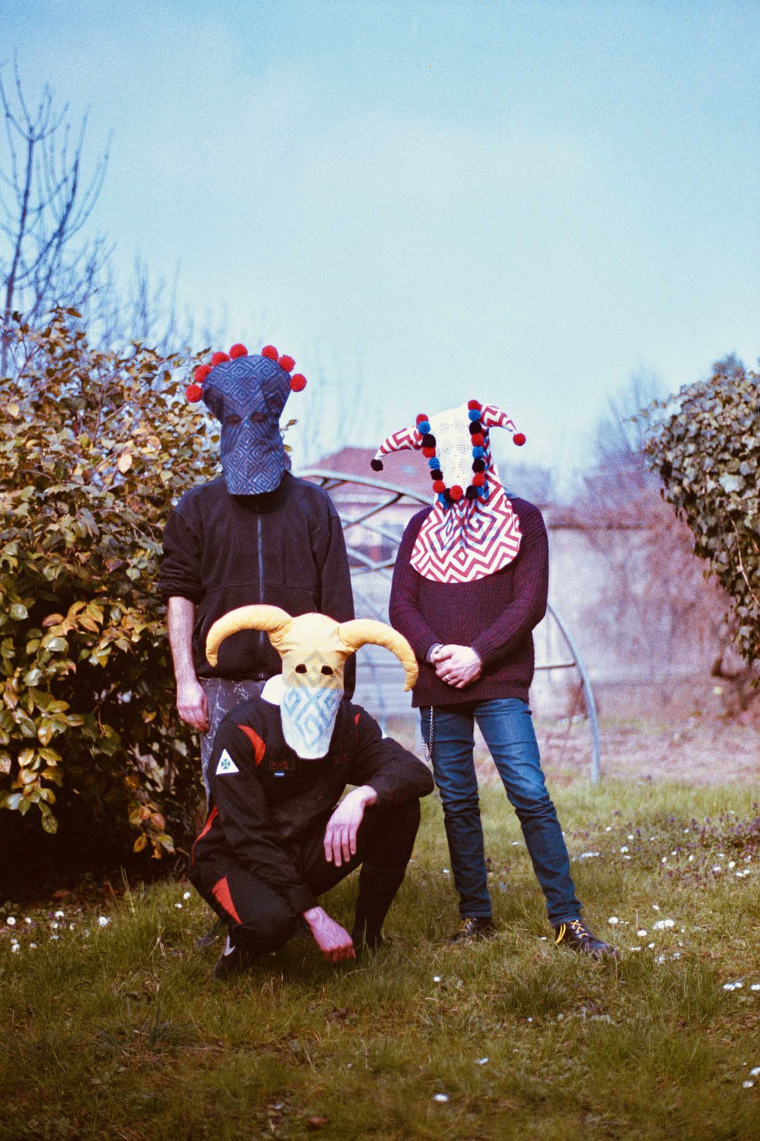 masked trio with handprinted and handsewn mask